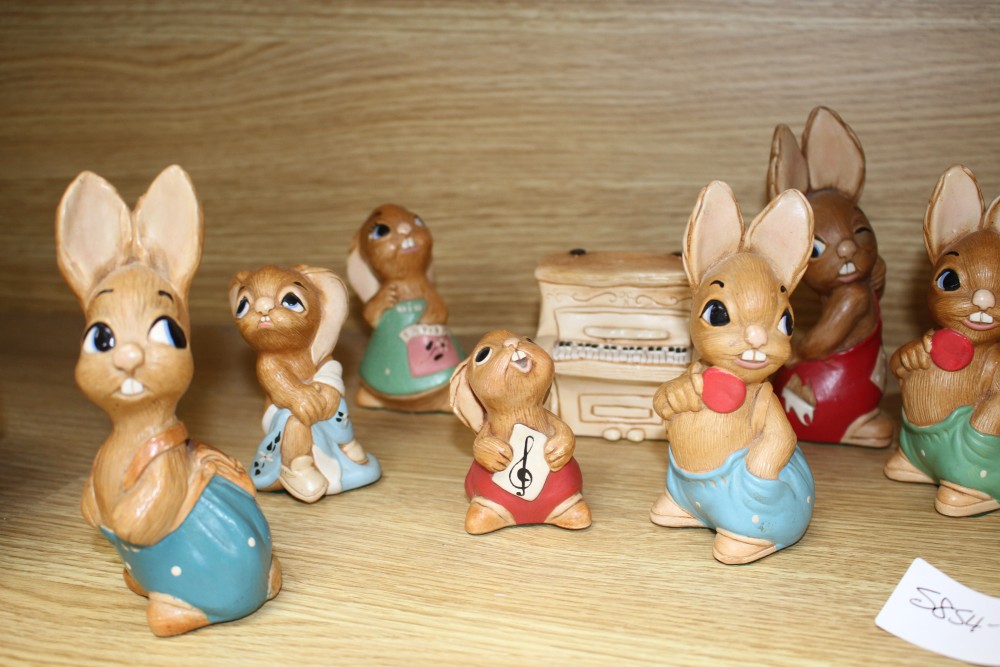 Eleven assorted Pendelfin rabbits and a piano